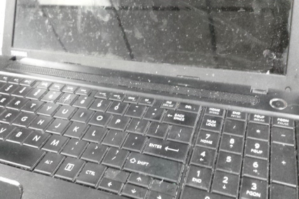Laptop with Dust and Dirt Particles