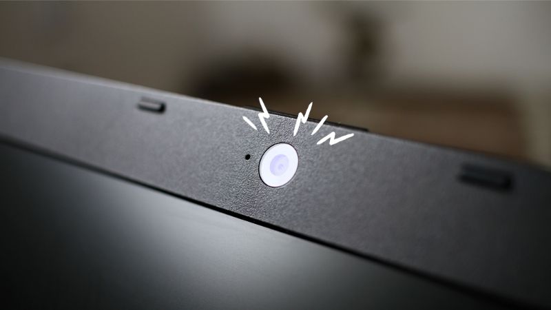 Close-up view of laptop integrated camera.