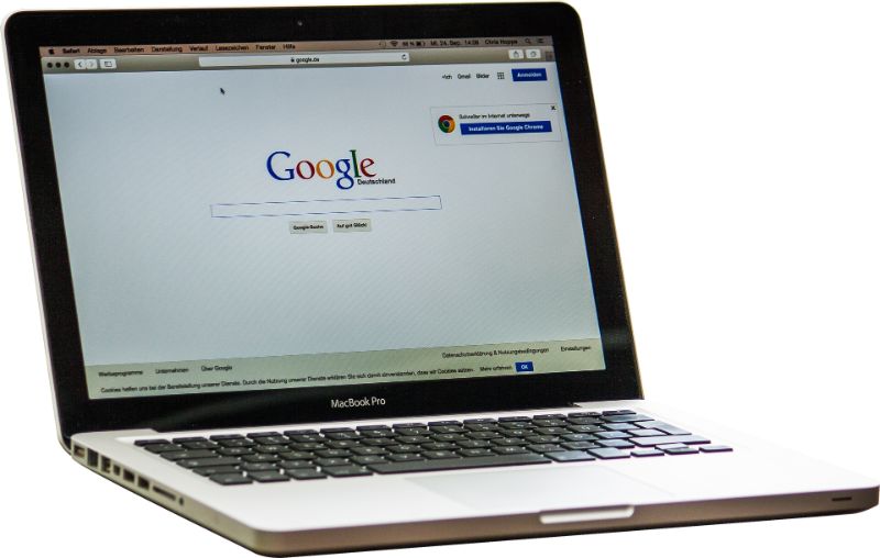 Laptop with internet access doing Google search.