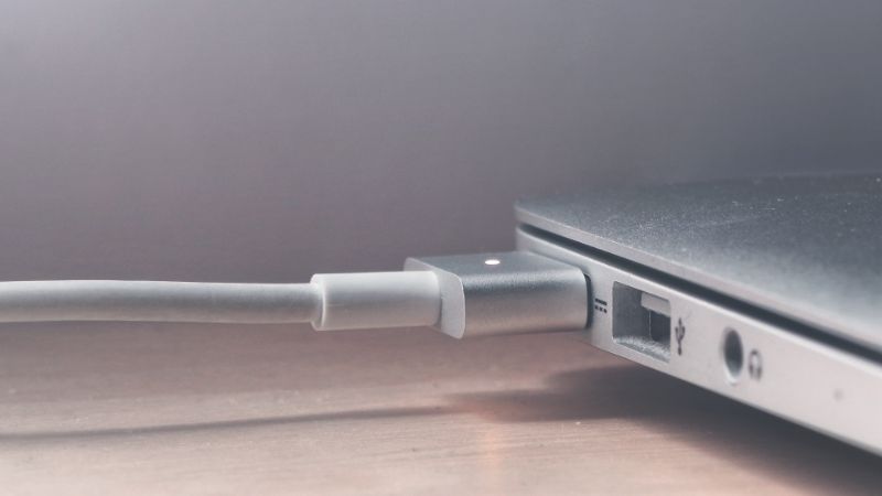 Laptop with charging cable connected
